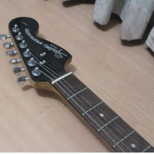 squier_black__chrome_standard_stratocaster_with_fender_97_stratocaster_pickups_tele_swtich_mod_1.JPG