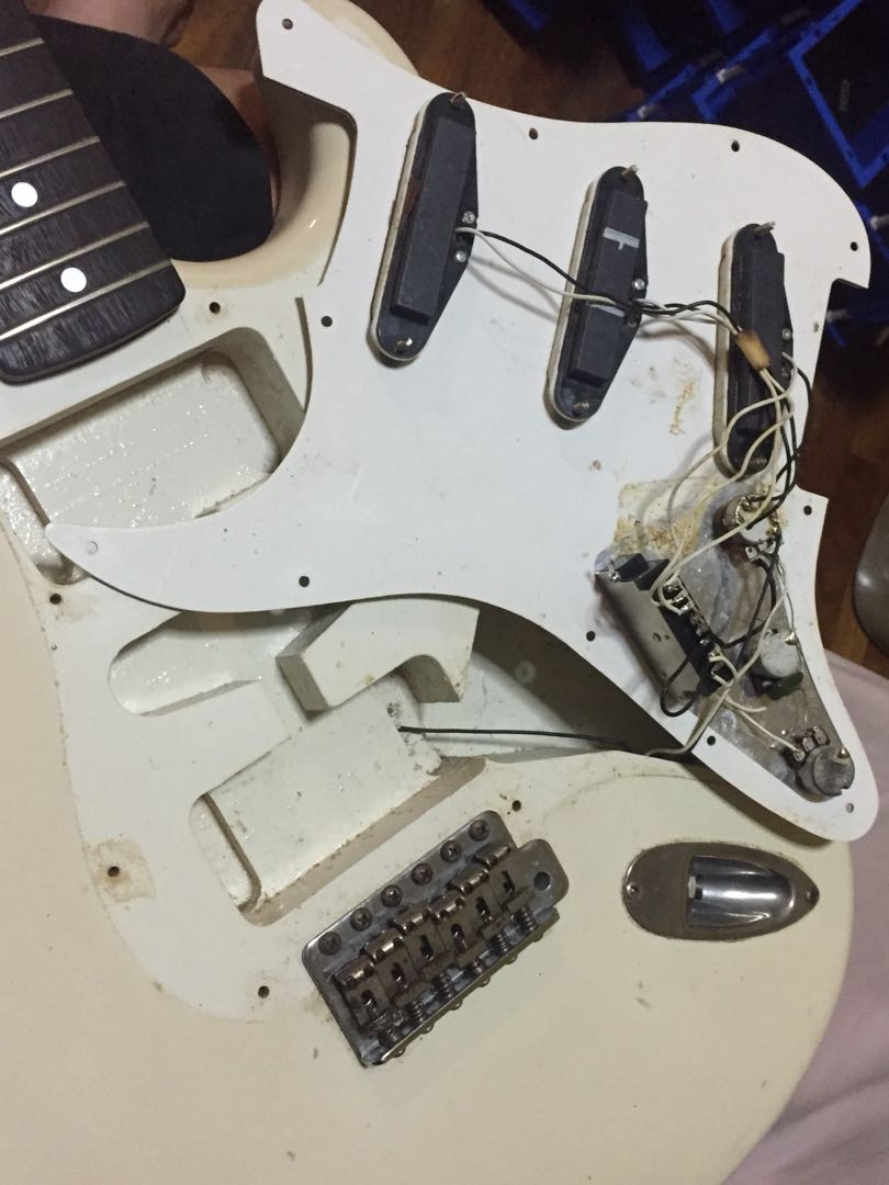 squier_japan_stratocaster_by_fender_olympic_white_natural_relic_1520865411_9c0a0b32.jpg